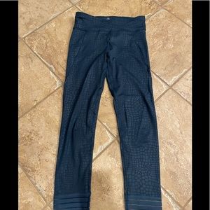 Sweaty Betty embossed tight with mesh details. Small.